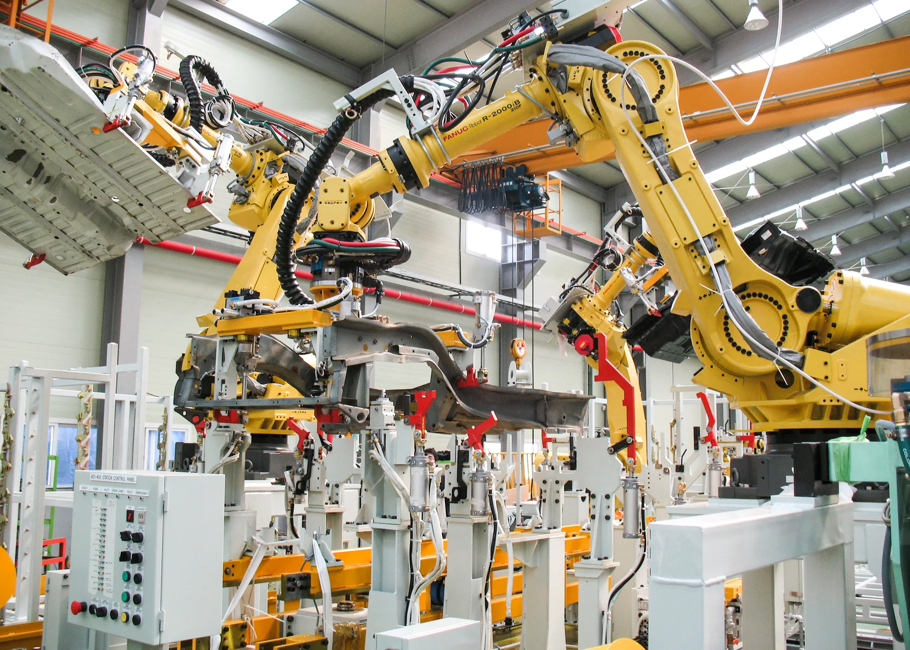 Imagem ilustrativa de celula robotizada industrial
